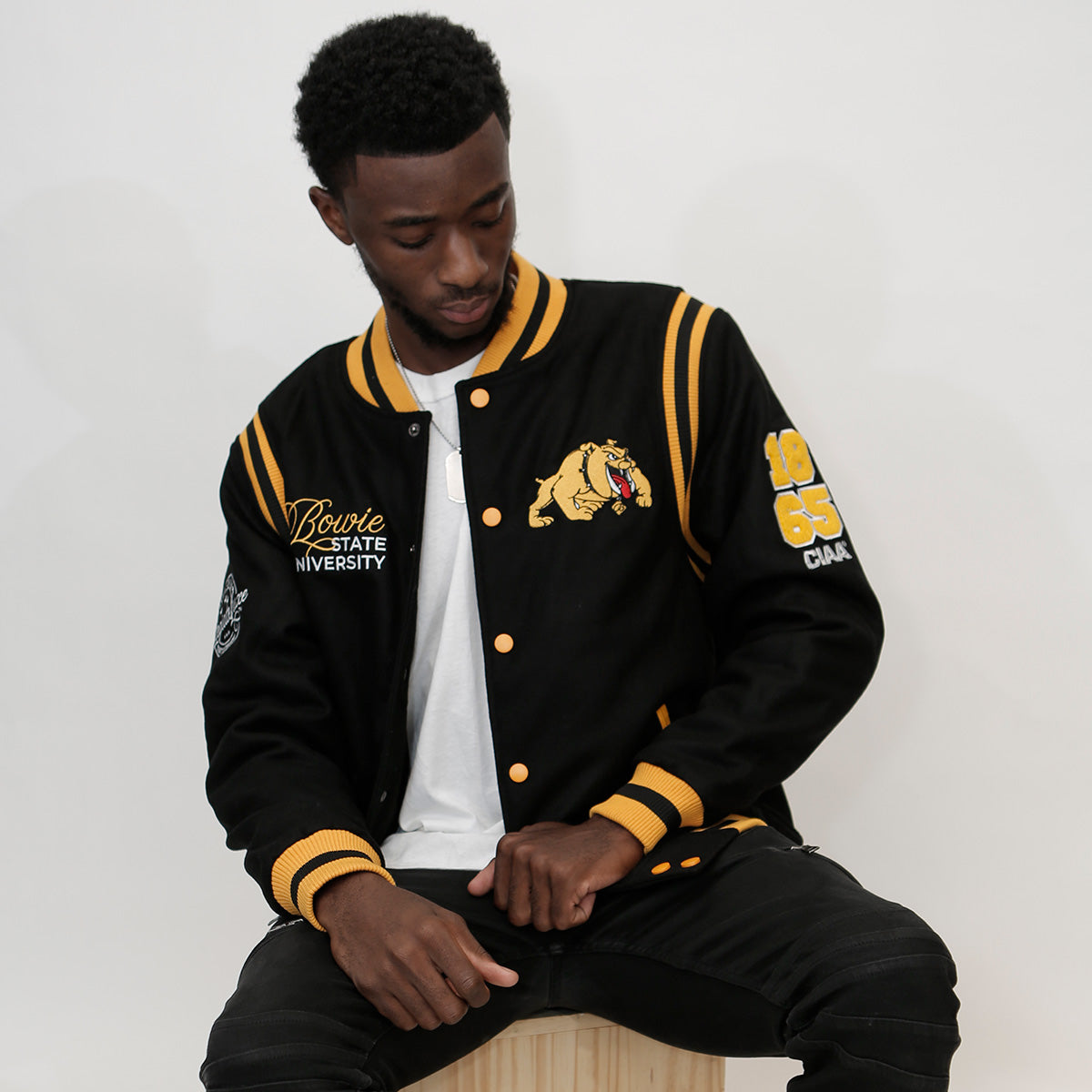 university gold jacket